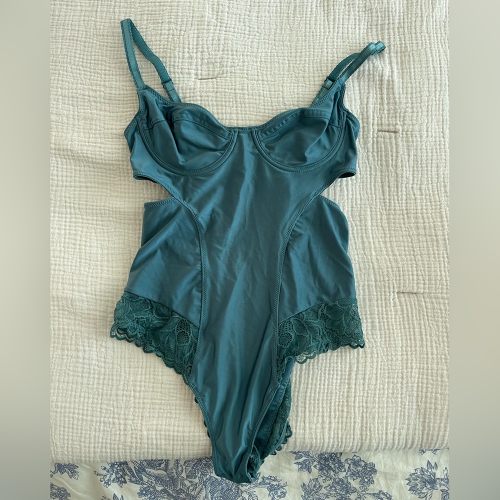 Green/blue corset bodysuit with lace detailing around the hips -Urban Outfitters